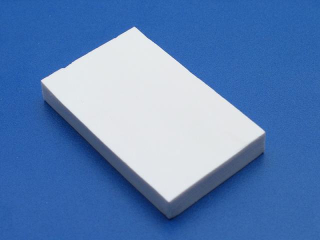 Cut a 6mm thick piece of sintra 1" wide by 1and 5/8 long. 
