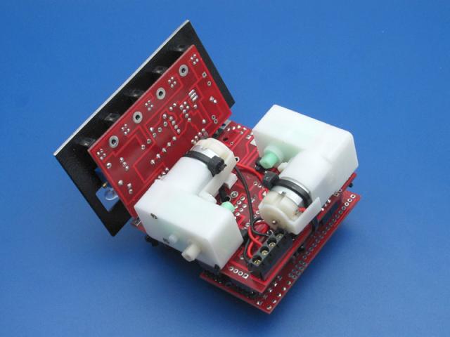 Take the wheels and battery pack off the Sumovore. 